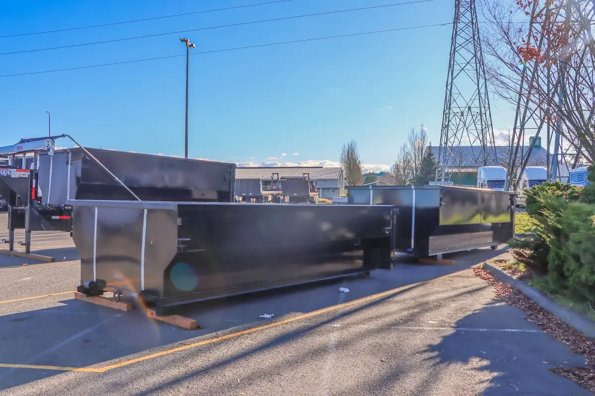 Roll-off dumpster ready for waste disposal at job site for 3 Yard Dumpster Rental in Faribault